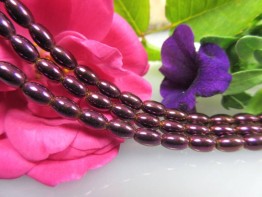Hämatinstein in lila, schöner Strang aus Fässern mit 6x4mm