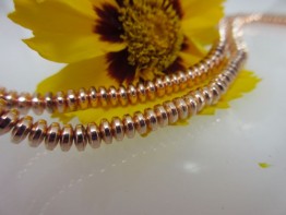 Hämatinstein in rosegolden, Strang allerfeinste Linsen 4,5mm